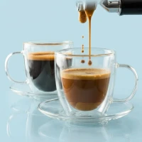 PIGNA MINI, two double wall glass espresso cups with saucers in a set, 2 x 100 ml, transparent